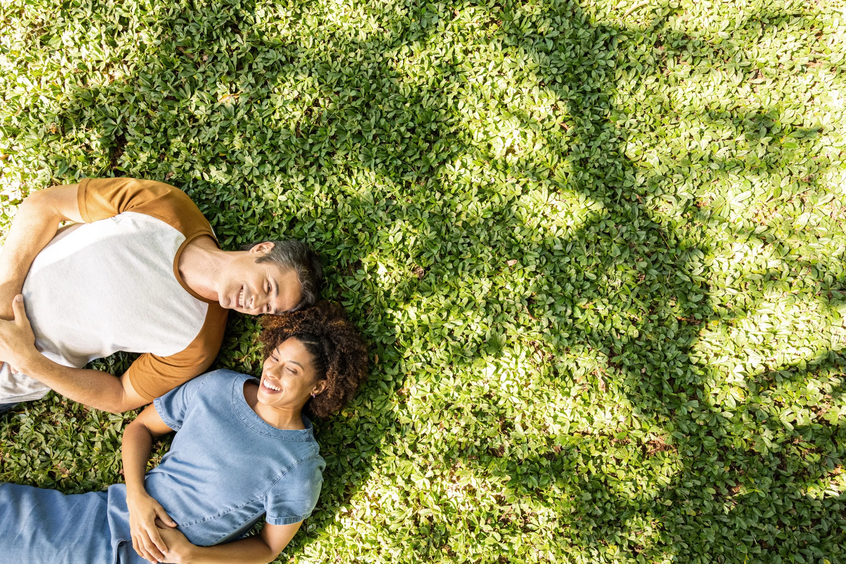 Couple relaxing on the lawn